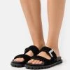 MICHAEL Michael Kors Damen GISELLE SLIDE - Pantolette Flach - Black 2 MICHAEL Michael Kors Damen GISELLE SLIDE - Pantolette Flach - Black -MICHAEL Michael Kors Geschäft 03625119ba364af1824a5509d60fe41d