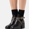 MICHAEL Michael Kors Damen KEISHA SOCK BOOTIE - Plateaustiefelette - Black/brown