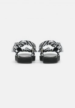 MICHAEL Michael Kors Damen PHOEBE - Riemensandalette - Black/white 12 MICHAEL Michael Kors Damen PHOEBE - Riemensandalette - Black/white -MICHAEL Michael Kors Geschäft 8e8d7de4773b478dbba7df8d8ff5eaf3