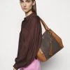 MICHAEL Michael Kors Damen CARRIELG TOTE - Handtasche - Brown -MICHAEL Michael Kors Geschäft e37bca28d6e54085ae7eed8b88435b65