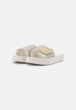 MICHAEL Michael Kors Damen PLATFORM SLIDE - Pantolette Flach - Champagne -MICHAEL Michael Kors Geschäft ff1dfdcfdaf84a06b500b180ebbec0f4